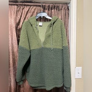 Green pullover jacket. Pink brand Size Medium